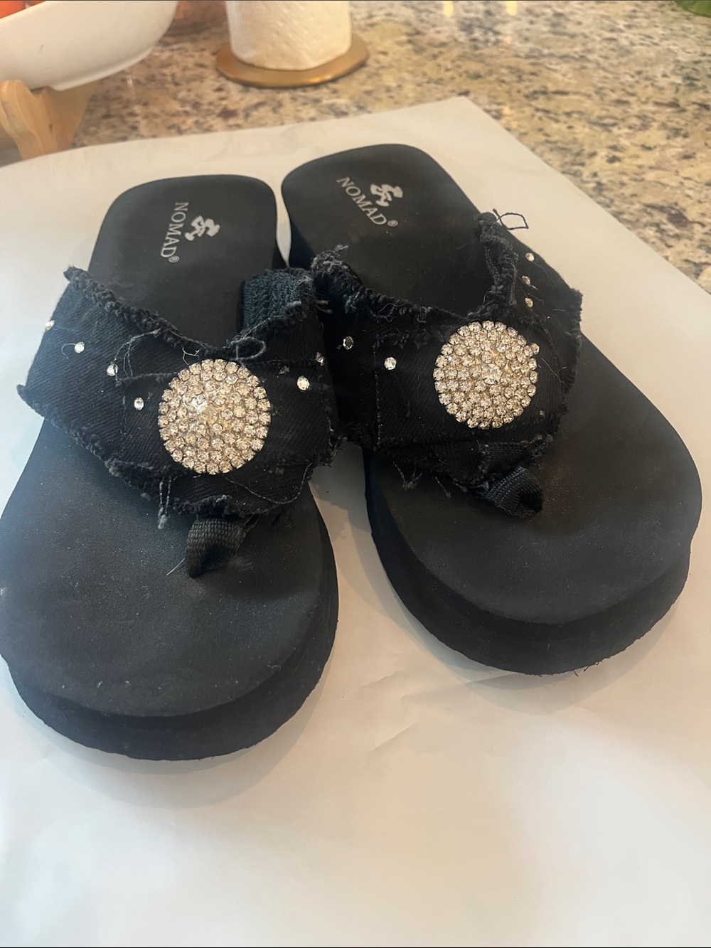 Nomad Black Slide Sandals with Crystal Medallion Accents
